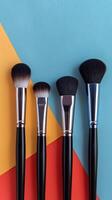 Makeup Brushes On Geometric Pattern photo