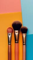 Makeup Brushes On Colorful Background photo