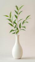 Elegant Greenery in White Vase photo