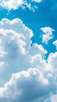 Fluffy Clouds in Blue Sky photo