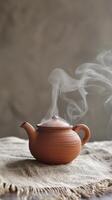 Steaming Traditional Clay Teapot photo