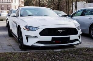 Minsk, Belarus, April 24, 2024 - White Ford Mustang photo