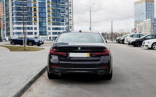 Minsk, Belarus, April 16, 2024 - BMW parking in city streets photo