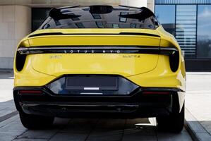 Minsk, Belarus, April 17, 2024 - Rear view yellow Lotus Eletre photo