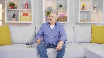 Depressed old man is home alone and nervous. video