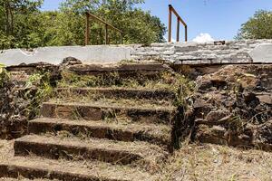 stairs in old abandoned outdoor building photo