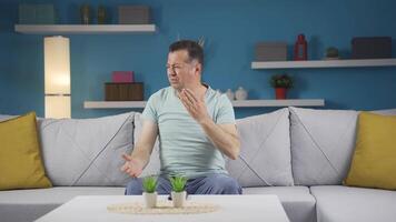 The man who smells bad odor is disturbed and disgusted. video