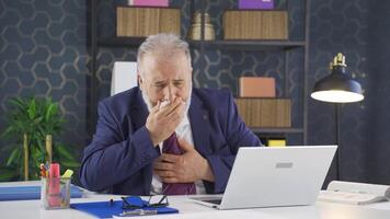 Sick businessman coughing and not feeling well. video