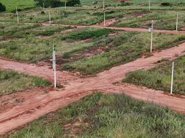 ew subdivision for houses, dirt road and power poles photo