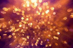 Sparkling glitter bokeh background with light. photo