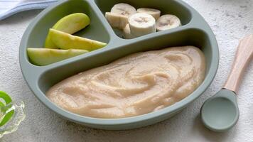 Healthy baby food in bowl. video