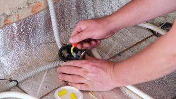 Close-up of electrician working on circuitry video