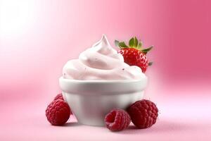 A bowl of creamy yogurt topped with fresh raspberries on a minimalist pink background. photo