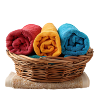 Basket of clean towels on a wooden table on isolated transparent background png