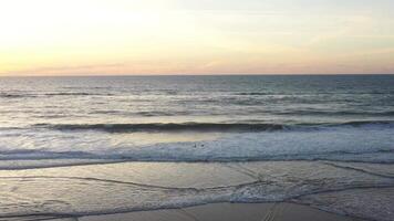 Aerial view of ocean horizon with sunset sky fly over. video