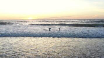 Aerial view of ocean horizon with sunset sky fly over. video