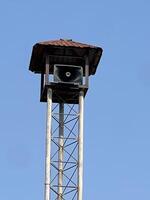 speaker tower on blue sky photo