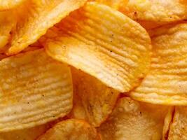 background of potato chips, top view photo