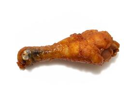 chicken drumsticks on a white background photo