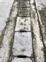 concrete floor with dirty and dirty sidewalk photo