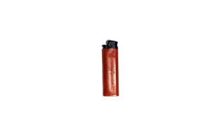 red cricket gas lighter. isolated image photo