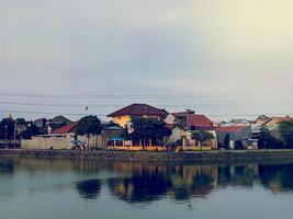 housing on the edge of the lake photo