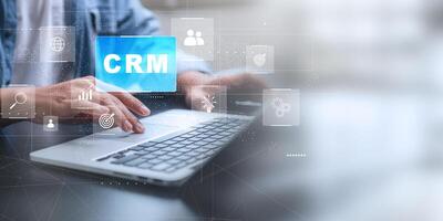 CRM - Customer Relationship Management. Businessman hold of global structure , Data exchanges development. customer service, social media, HR, digital marketing online. photo