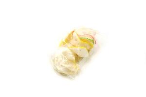 Small, colorful crackers wrapped in clear plastic. These crackers have a delicious taste because they are cooked by frying. Crackers can be used as a complementary food, or as a snack photo