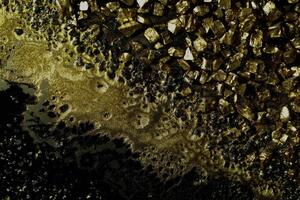 Black and golden marble textured background photo