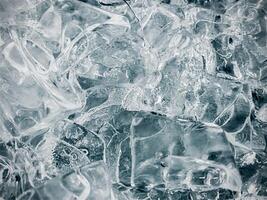 cubos de hielo fondo,cubitos de hielo textura, cubitos de hielo papel pintado, hielo ayuda a sensación refrescado y frio agua desde el cubos de hielo ayuda el agua actualizar tu vida y sensación bueno.hielo bebidas para refresco negocio foto