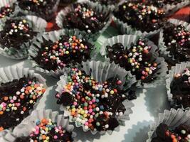 Chocolate peanut cake with cereal topping photo