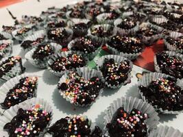 Chocolate peanut cake with cereal topping photo