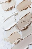 Assorted Shades of Foundation Makeup Swatches on a White Background photo