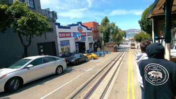 San Francisco USA 20.09.2022 ,The Cable car system is a manually operated system, a tourist attraction of San Francisco, California, USA, The view through the eyes of a tourist from a trailer on the video