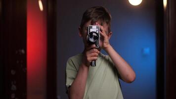 portrait of a boy shoots on an old vintage 8mm camcorder video