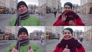 Portrait of old senior man tourist smiling, looking at camera in winter city center of Lviv, Ukraine video