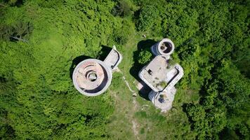 Aerial drone view of the destroyed Colina Kapa, Astronomical Observatory, in Sarajevo, Bosnia and Herzegovina. photo