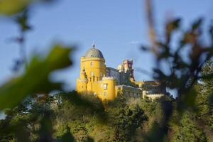 View of the National Palace of Pena in Sintra, Portugal. Unesco World Heritage. Historic visits. Holidays and vacation tourism. Colorful palace. Most visited places. photo