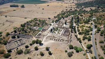 Aerial drone view of the Caliphate City of Medina Azahara in Cordoba. Archaeological site. Unesco World Heritage, Spain. Ancient civilization. Historic place. Touristic destination for holidays. photo