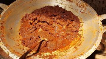 Beef Rendang food being cooked. one of the popular traditional Indonesian foods video