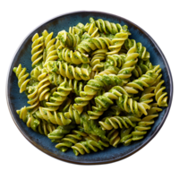 Green pasta on plate top view isolated. Pasta with green organic vegetable sauce flat lay. Green pasta with parmesan cheese isolated png