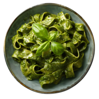 Green pasta on plate top view isolated. Pasta with green organic vegetable sauce flat lay. Green pasta with parmesan cheese isolated png