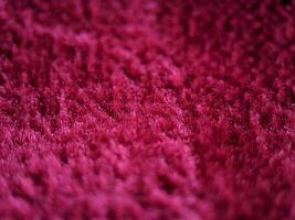 Macro of red fabric texture photo