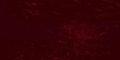 Abstract Dark Color Design, Textured Cement Wall in Black and Red with Light Gradient. photo