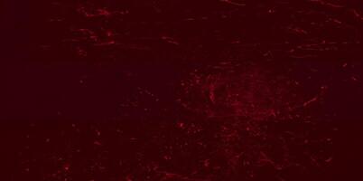 Abstract Dark Color Design, Textured Cement Wall in Black and Red with Light Gradient. photo