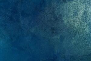 Cerulean Canvas, Textured Blue Paint Wall Background. photo
