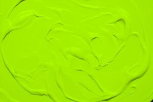 Vibrant Green Paint Swirls, Burst of Colorful Creativity. photo