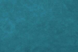 azul texturizado cuero fondo, lujoso textura en vibrante azul matiz. foto