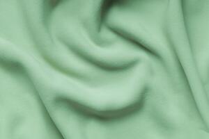 Soft Green Fleece Texture, A Cozy Background. photo