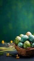 A basket of colorful eggs with copyspace on a green background. Easter egg concept, Spring holiday photo